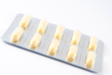 Closed up side of capsule in  transparent blister pack