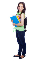 Full body portrait of a female student carring notebooks and bac