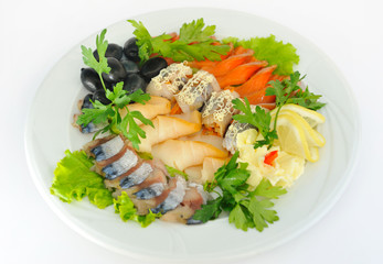 Sliced ​​salmon,  decorated with green olives .