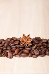 coffee beans on wooden surface background