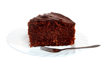 Piece of chocolate cake on white plate
