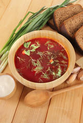 Delicious borsch on table close-up