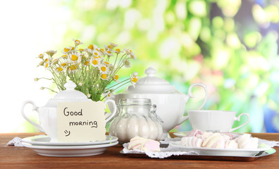 Table setting with chamomiles