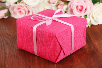 Romantic parcel on wooden background