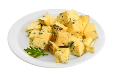 Tasty blue cheese on plate, isolated on white