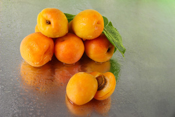 Apricots on metal background
