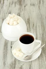 Cup of coffee, on color wooden background