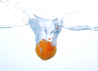 Juicy fruit under water, isolated on white