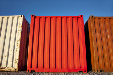 three shipping containers