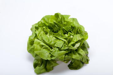 Fresh green Lettuce salad isolated on white background