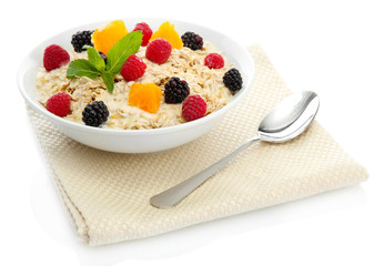 tasty oatmeal with berries, isolated on white