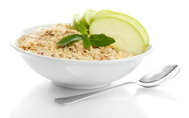 tasty oatmeal with apple, isolated on white