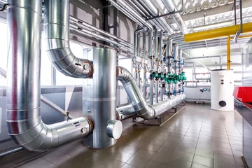 Fotobehang interior of an industrial boiler, the piping, pumps and motors © Aleksey Sergeychik