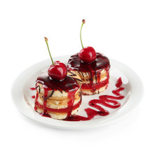 Tasty biscuit cakes with jam and berries