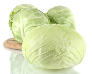 Cabbage on board for cutting isolated on white
