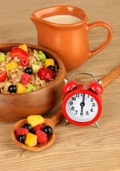 Oatmeal with fruits on table close-up