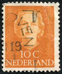 stamp printed in Netherlands, shows portrait of Queen Juliana