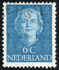 stamp printed in Netherlands, shows portrait of Queen Juliana