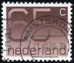 stamp printed in the Netherlands shows numeral ordinary gum