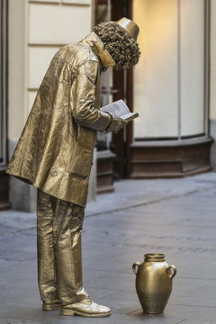 Gold Painted Street Pantomimic Artist