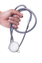 Stethoscope in the hand on white background