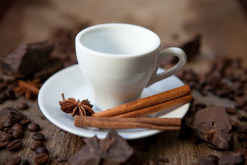 coffee cup with cinnamon sticks