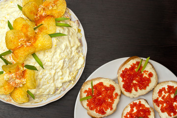 orchid salad and sandwiches with red caviar