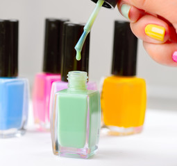 Nail Polish. Manicure. Colorful Nail Polish Bottles