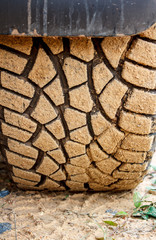 The tire car on a dirt road