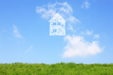 草原と家の雲