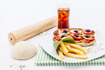 Pizza baguette with sausages and tomatos.