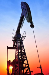 Oil Pump on orange sunset