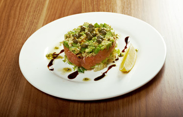 Salad with salmon with sauce.closeup