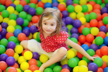 Fototapeta na wymiar A girl having fun at the playground