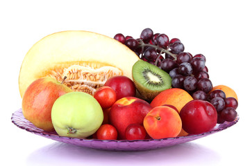 Assortment of juicy fruits isolated on white