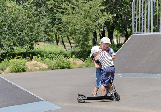 Two Brothers Fighting Over A Scooter