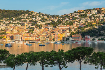Fototapeta premium Early morning sun striking over Villefranche sur Mer