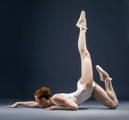 Image of flexible ballerina dancing in studio