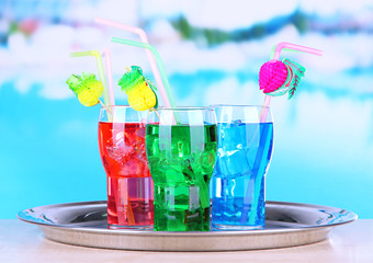 Different cocktails on bright background