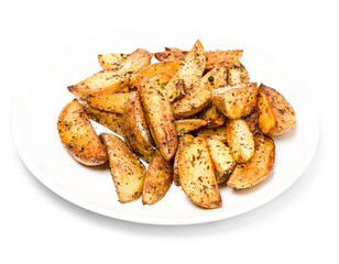 French fries potato wedges in country styled with spices on a pl