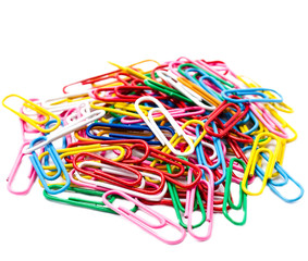 Pile of colorful paper clips isolated on white background