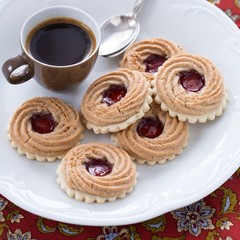 Espresso and swiss cookies filled with fruit jam
