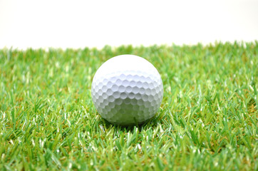 golf ball on green grass