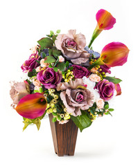 Bouquet of rose and lily in wood bucket