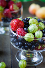 Summer berries in a transparent glass
