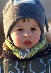 Child in freezing with cap