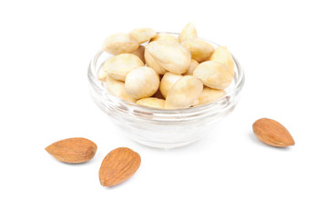 Dried  peeled almonds on glass bowl