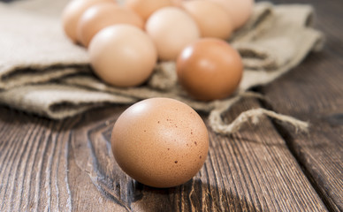 Fresh Eggs on wooden background