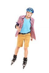 Full length portrait a male on rollers skating