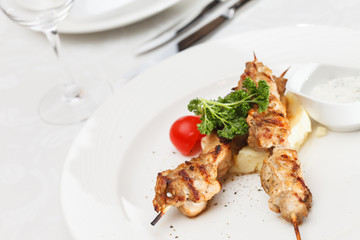 Skewered meat with vegetables